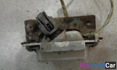 Фонарь подсветки номера от Mitsubishi Lancer Cedia CS 2000-2003